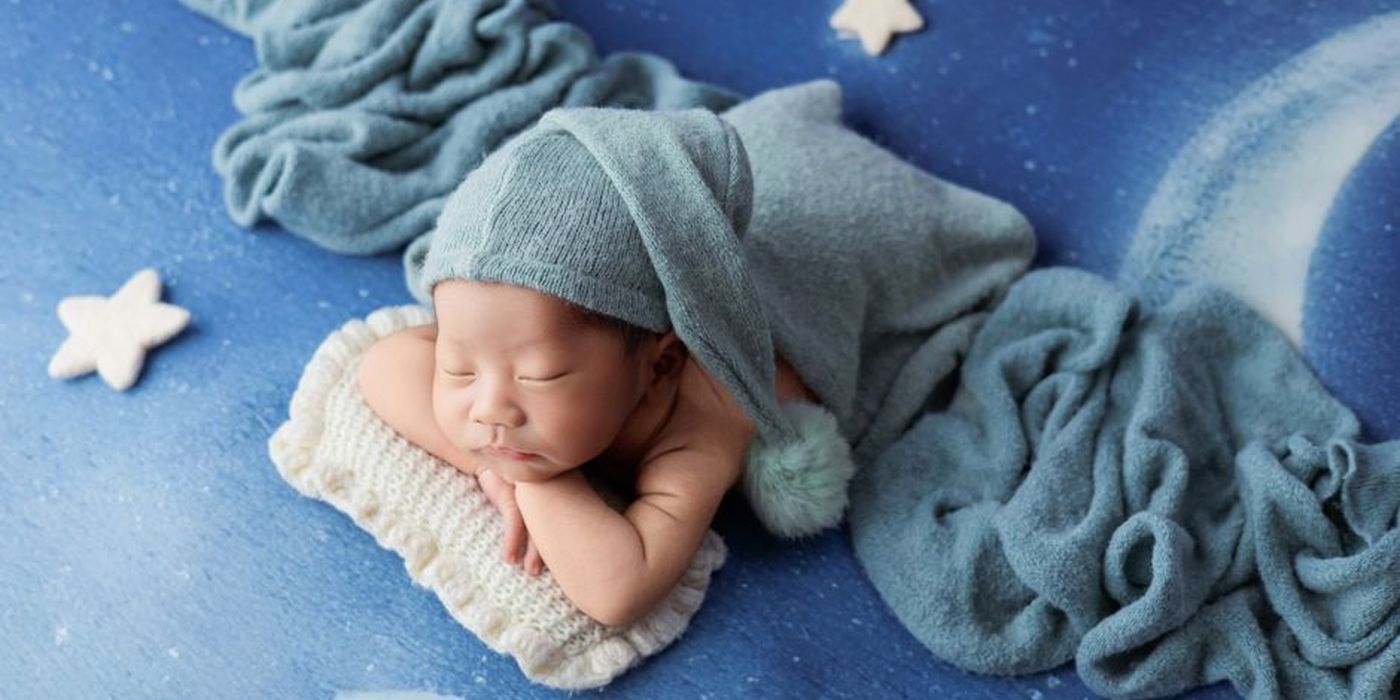 Bayi lelaki dibalut selimut